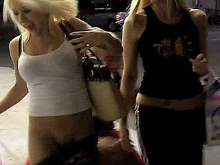 Two Cute Beauties shopping at the ninety nine cent store are being stocked by a pair of creepsters. One Time they go out side one of the dudes runs up and pulls the blond's pants down. Is there grass on the field?