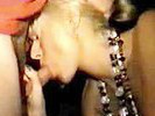 Mardi Gras Blonde Beauty Engulfing Cock